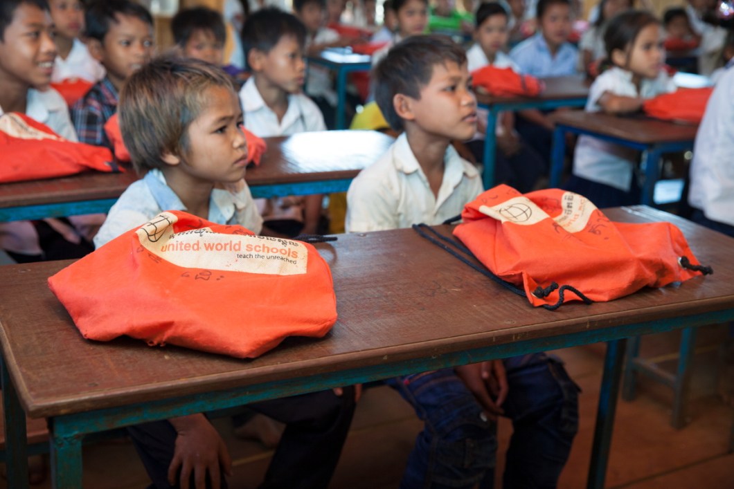 Children with schoolbags in class, UWS Blai School Cambodia