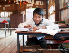 Boy working in class, UWS Ol Tuch School, Cambodia (photo by Anna Willett)